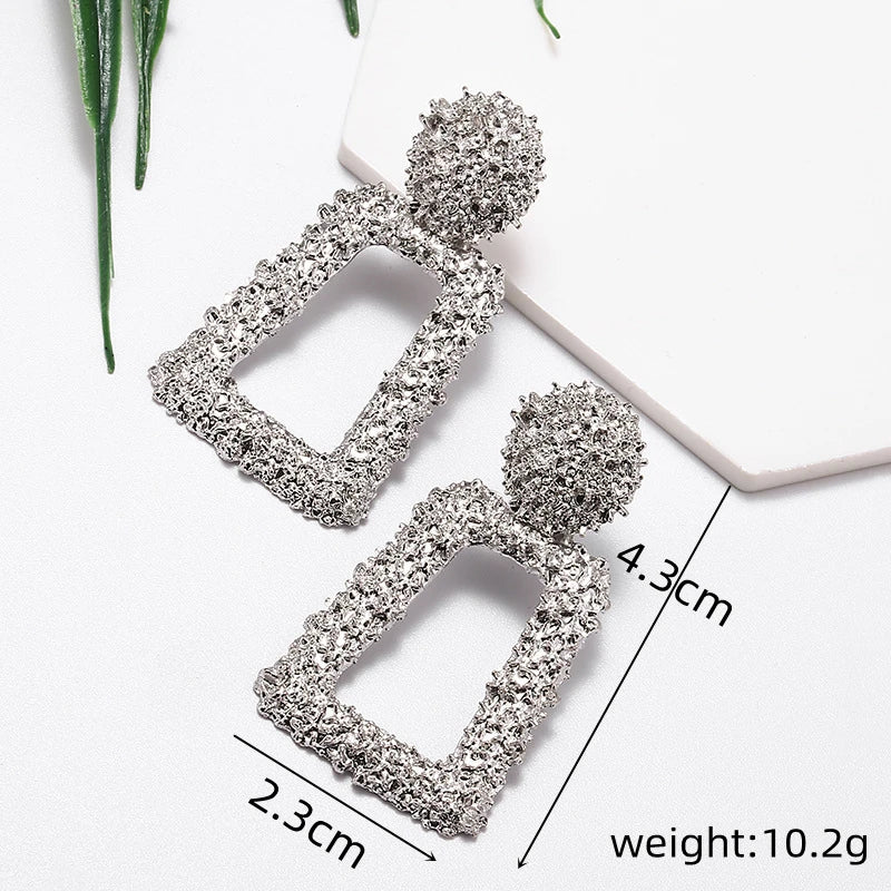 Hollow geometric trapezoid drop earrings