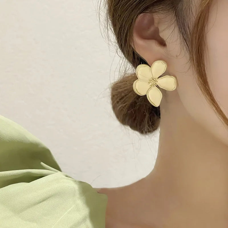 Gold flower earrings