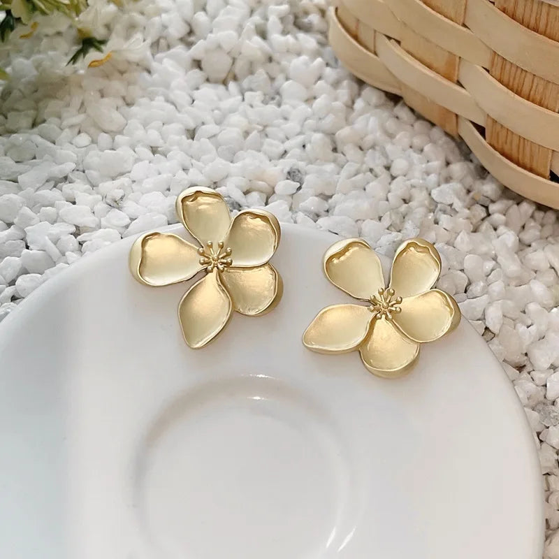 Gold flower earrings