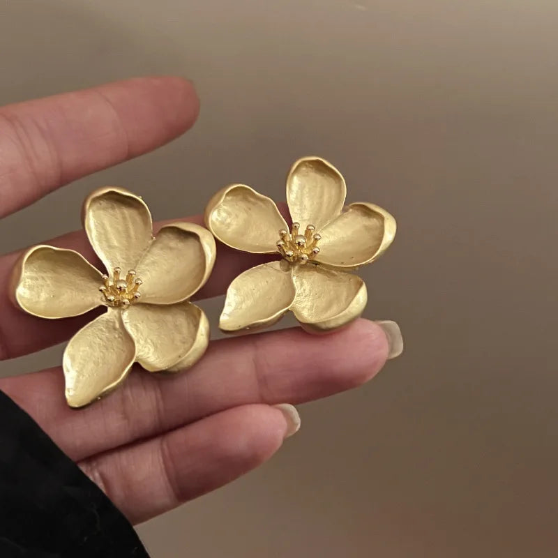 Gold flower earrings